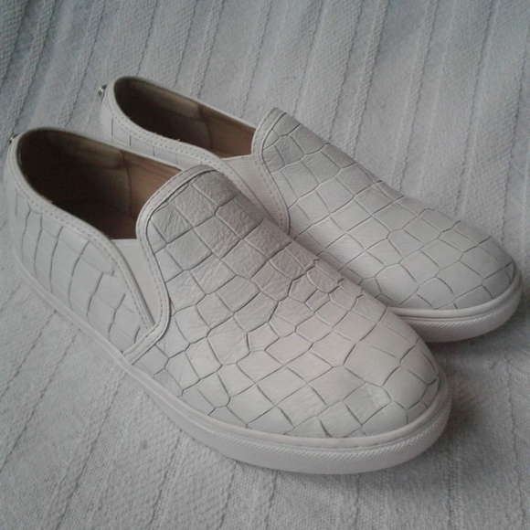 white leather slip on tennis shoes